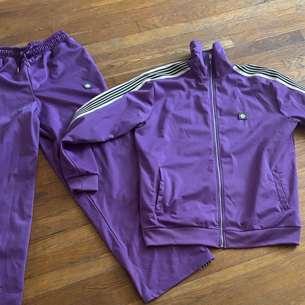 Purple Track Suit Runs Large